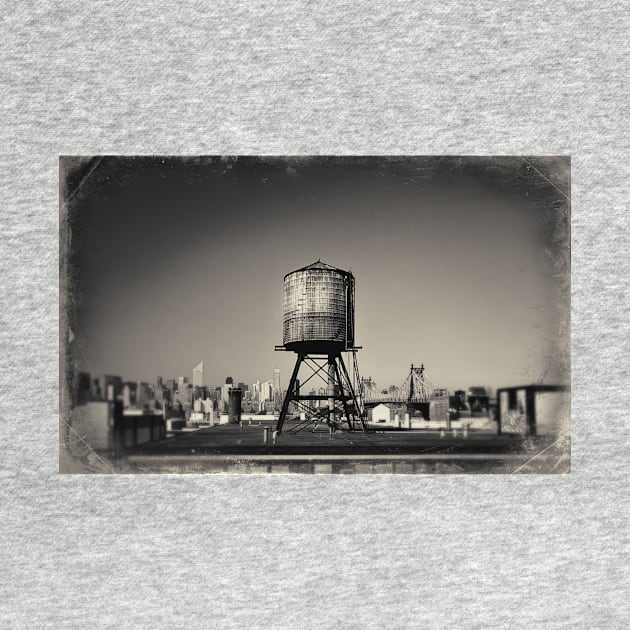 Sepia-toned image of a rusty water tower on a rooftop of Queens, in New York City, with the Queensboro Bridge and the Manhattan skyline in the background. by Reinvention